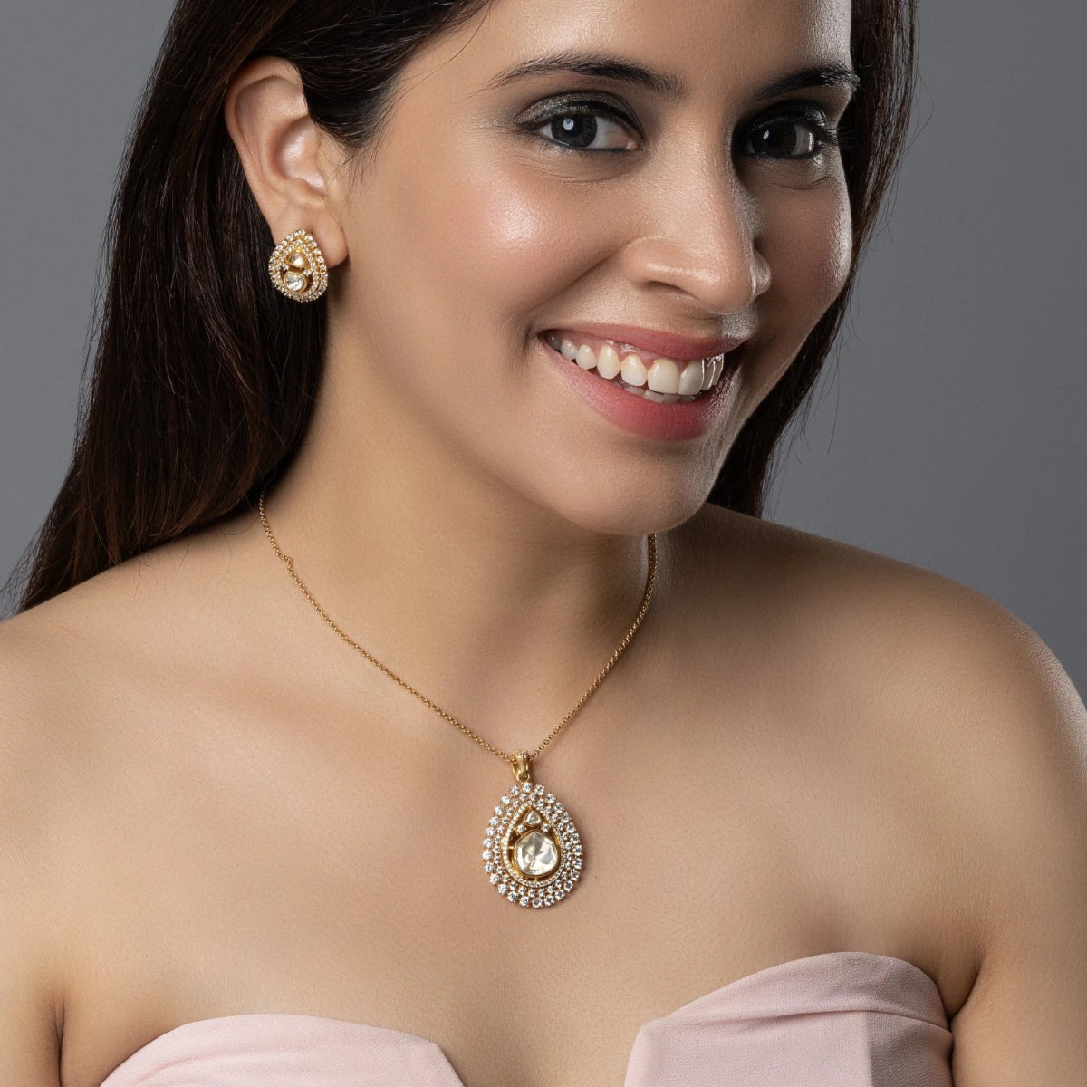 Radiant Heritage Gold-Toned Pendant & Earring Set