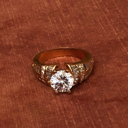 Rose Gold Tone Solitaire with Baguette Ring